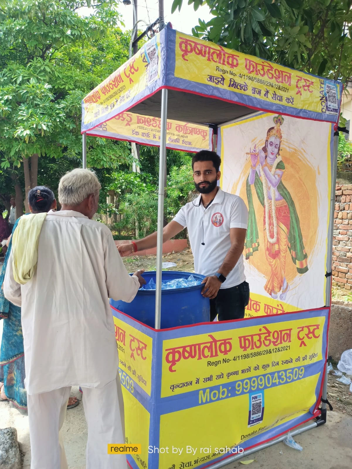 Volunteers performing Mandir Seva at the temple